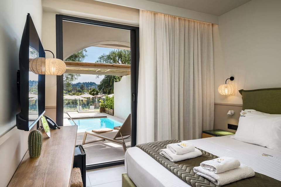 Deluxe Suite, Private Pool, Sea View | Hypo-allergenic bedding, in-room safe, soundproofing, iron/ironing board