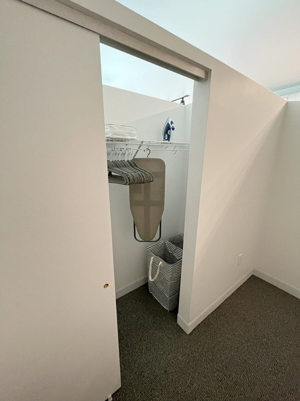 Closet with Hangers, Iron, Ironing board, Hamper