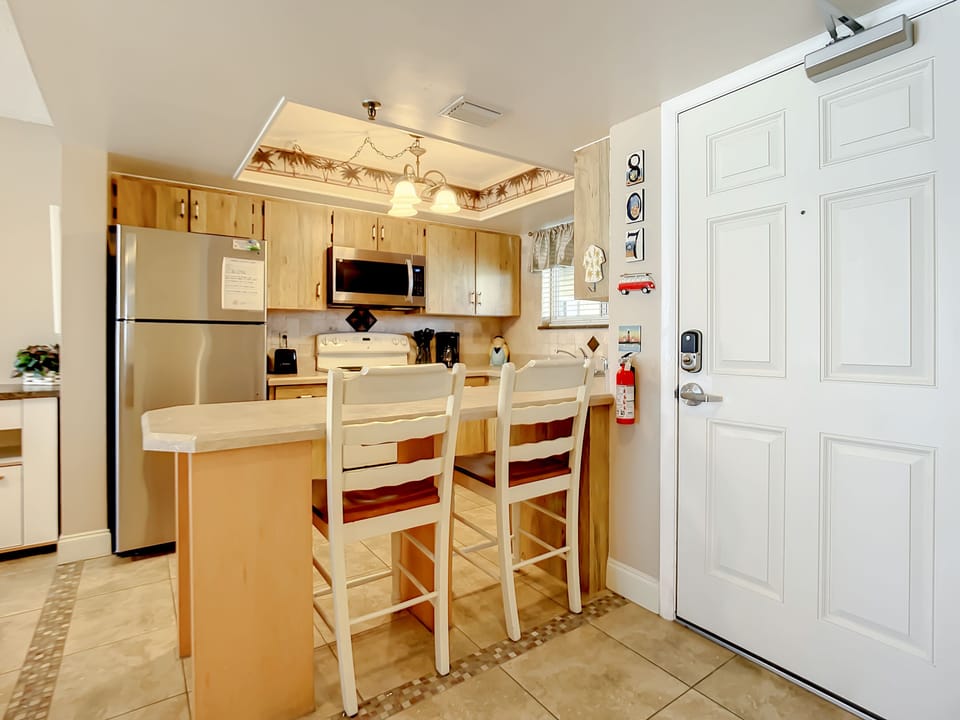 Start your day at the inviting breakfast bar, perfect for casual meals or coffee.