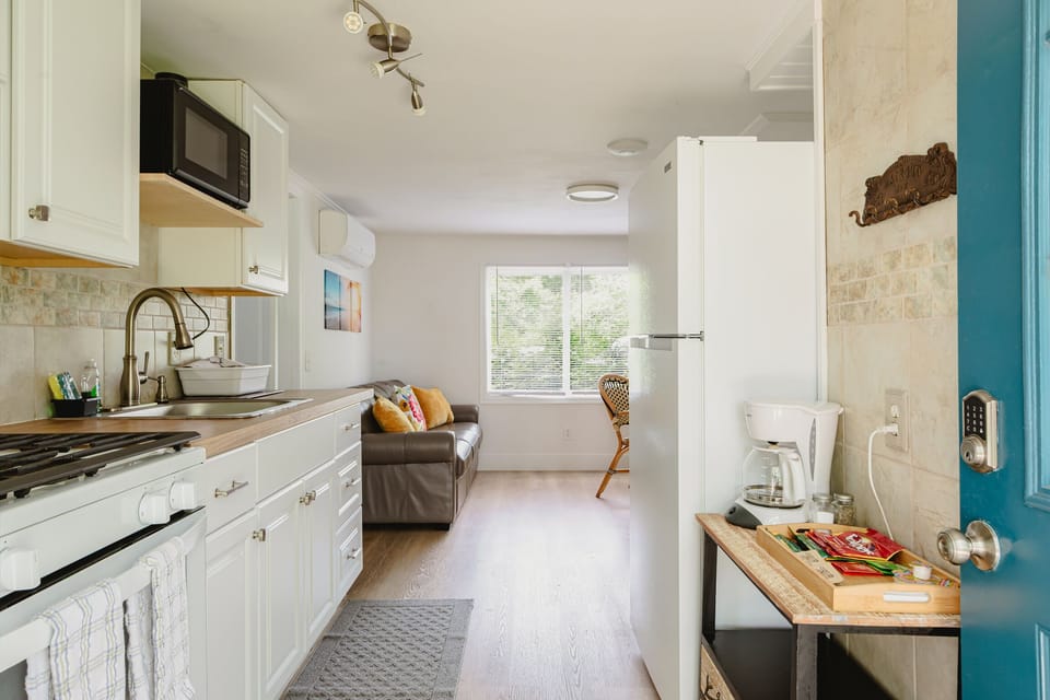 Cottage, 3 Bedrooms (1 Queen & 4 Twin Beds - Pet Friendly +FEE) | Private kitchen | Microwave, coffee/tea maker, cookware/dishes/utensils