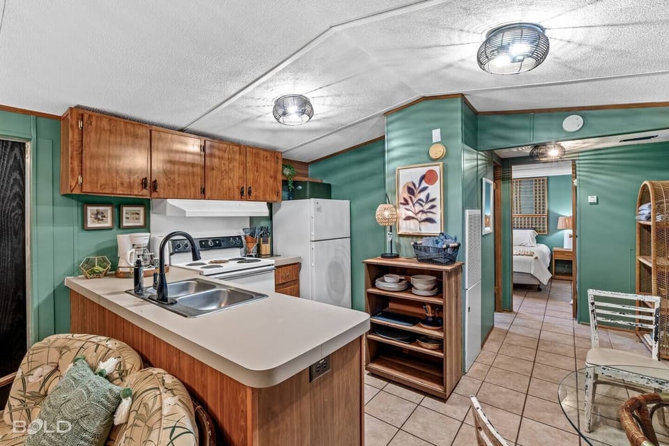 Full-size refrigerator & stove/oven.
