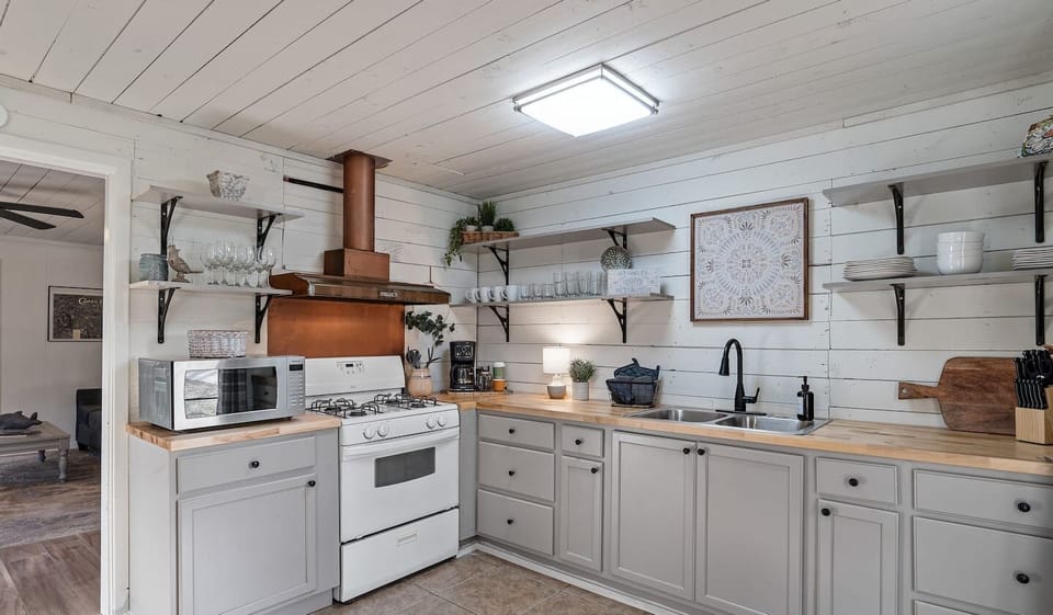 The kitchen is furnished with everything needed to prepare a meal.