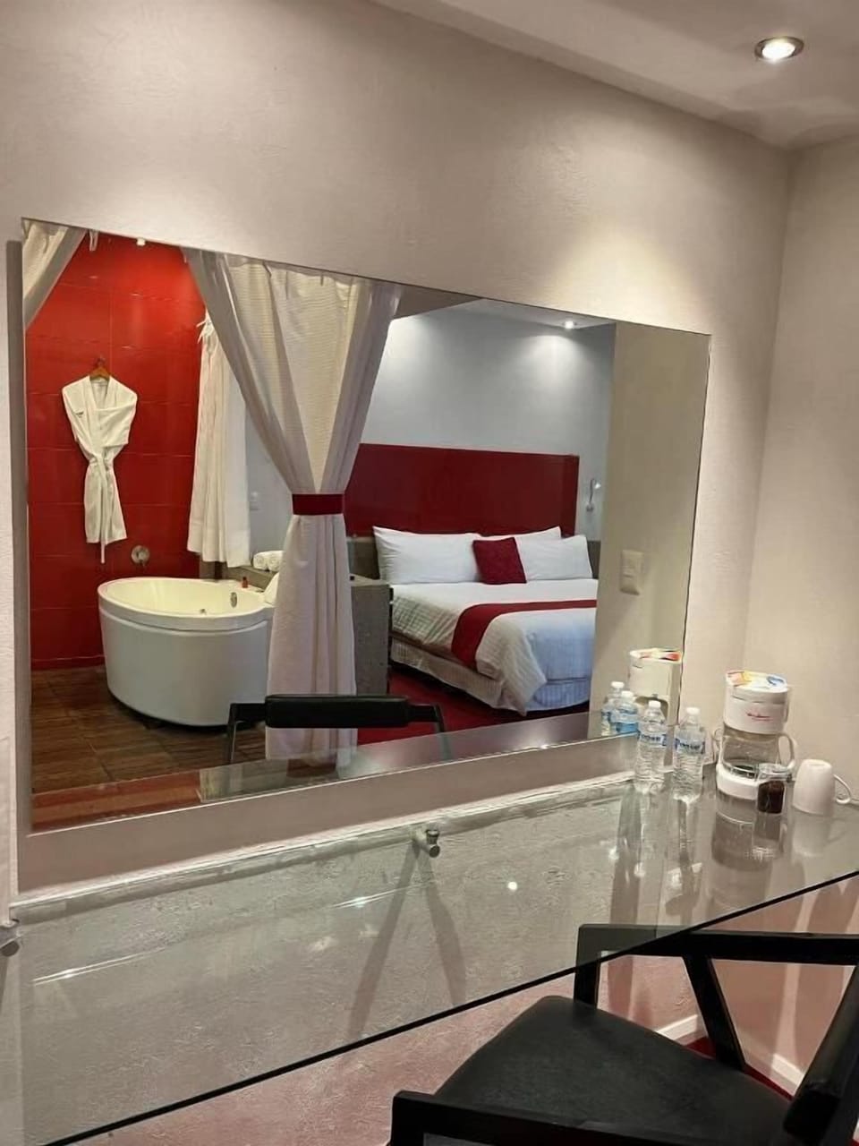 Premium bedding, desk, laptop workspace, soundproofing