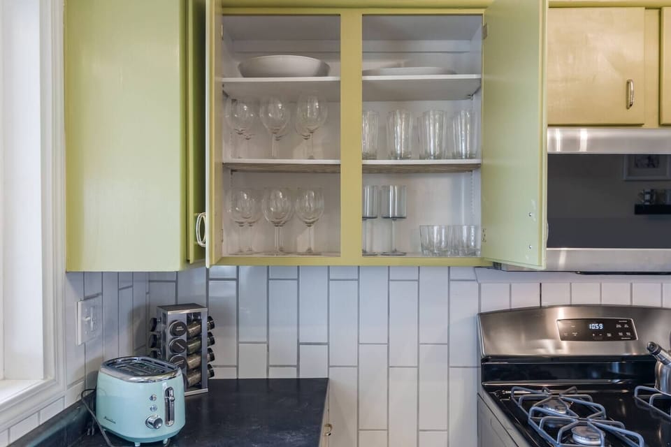 Fully equipped kitchen with stainless steel appliances, ample cabinet space, and bright natural light for easy everyday living.