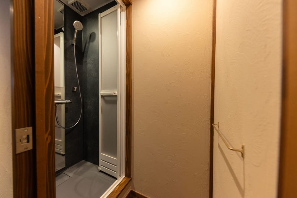 Twin Room | Bathroom | Hair dryer, towels, soap, shampoo