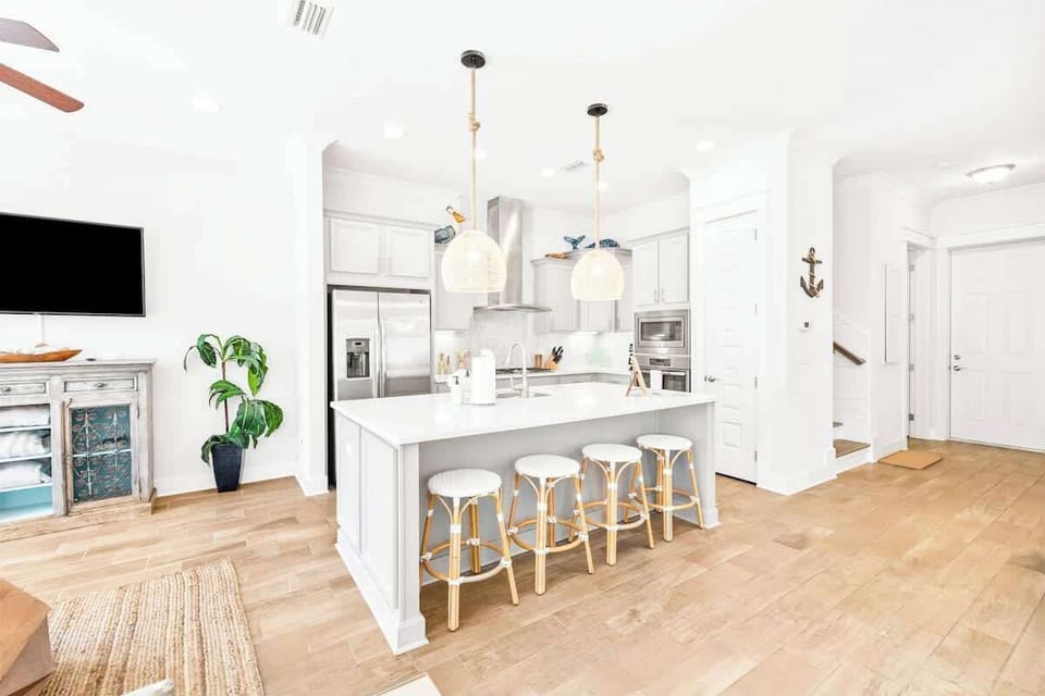 Large island in gourmet kitchen.