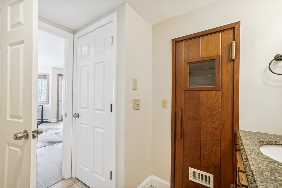 Conveniently located full bath with updated finishes and easy access from the bedroom area