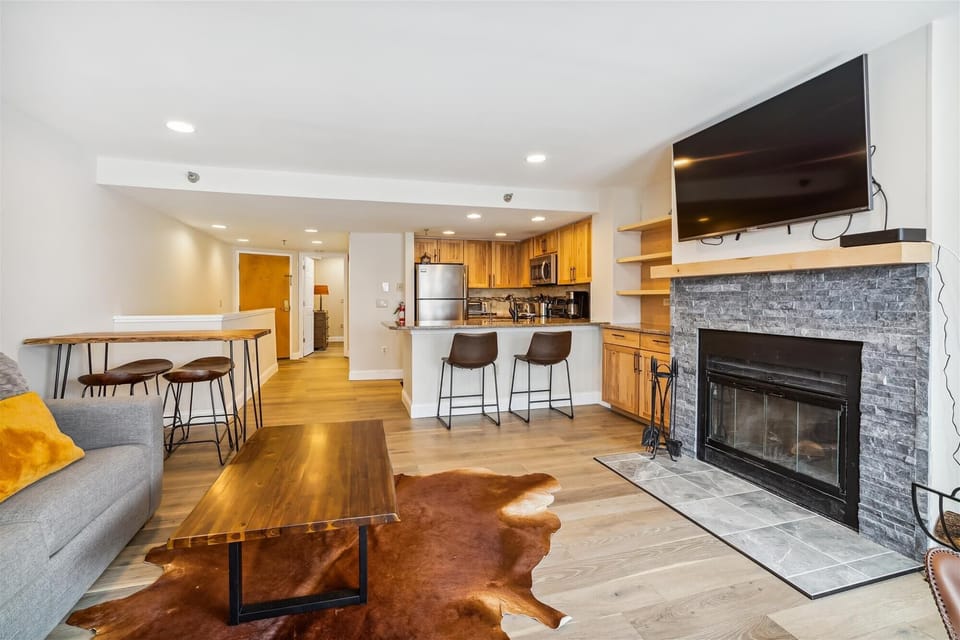The open layout connects the kitchen, dining, and living spaces for easy entertaining and relaxing.