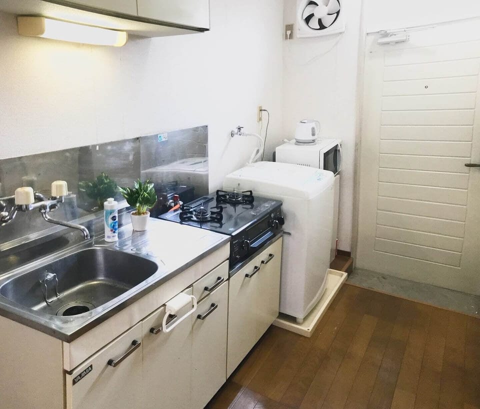 Mini-fridge, microwave, stovetop, cookware/dishes/utensils