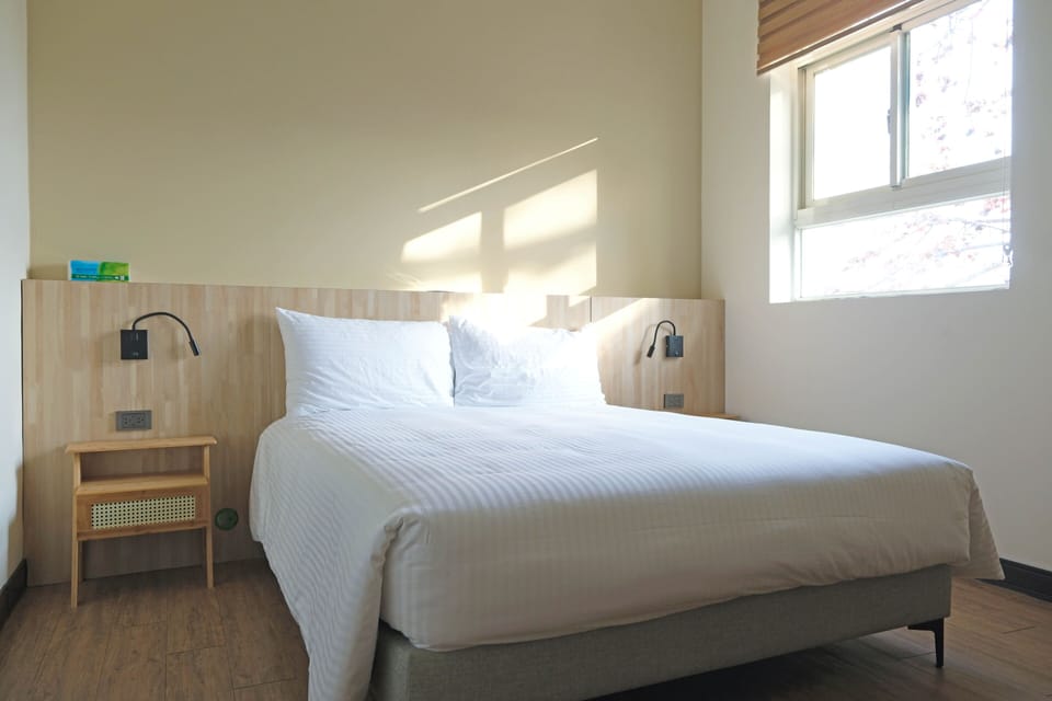 Basic Double Room | Premium bedding, down comforters, laptop workspace, free WiFi