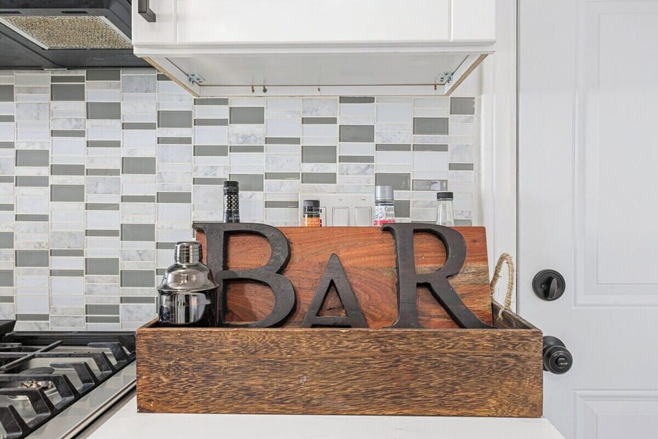 Chic Home Bar – Elevate your stay with a stylish in-home bar, perfect for crafting cocktails and unwinding in style. A sophisticated touch for those who love entertaining.