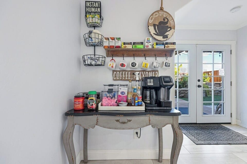 Cozy Coffee Bar Haven – Wake up to a dedicated coffee station, fully stocked with everything you need to start your day right. Enjoy a fresh brew in a charming, inviting nook that feels like your favorite café.