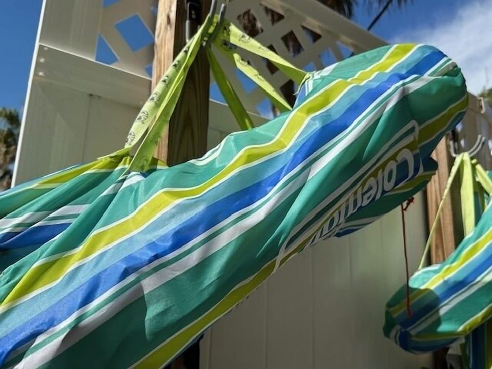 Folding sand chairs with carry bags are provided.. 