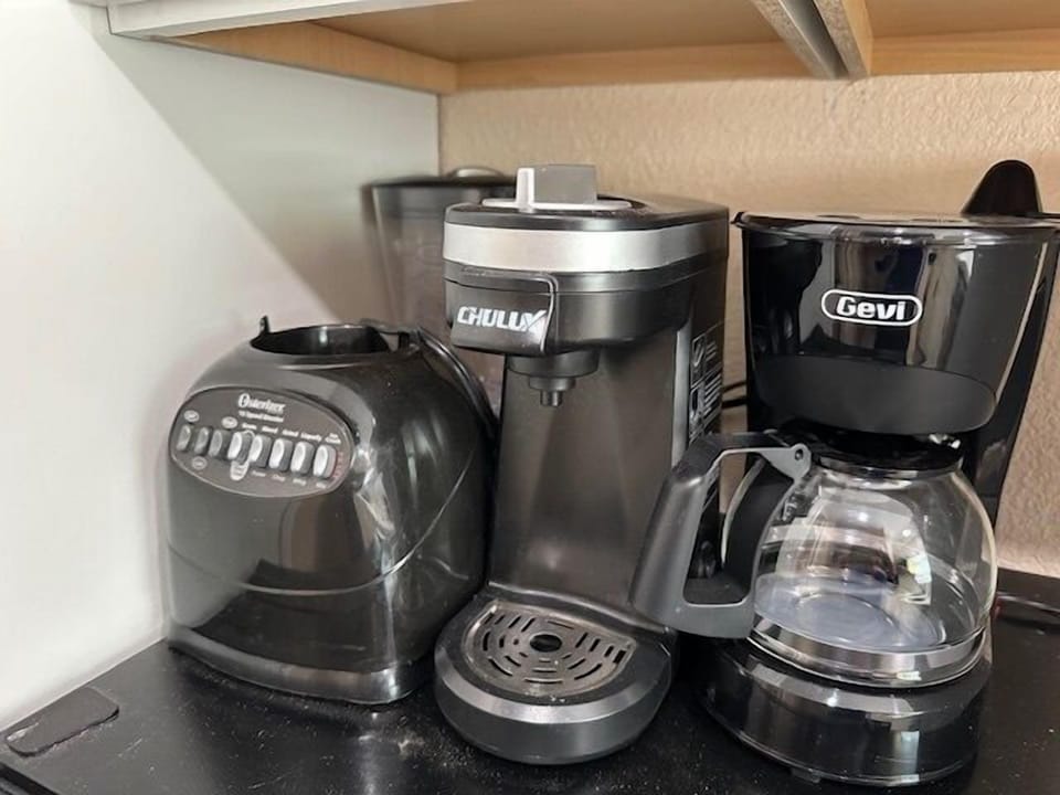 Both traditional-style compact coffee maker and Keurig-style coffee makers are provided. A blender for smoothies or margaritas and a pop-up toaster.are also offered.  