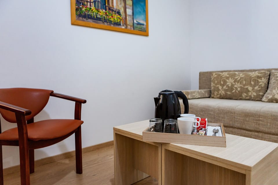 Standard Suite | Living area | 40-inch LCD TV with cable channels