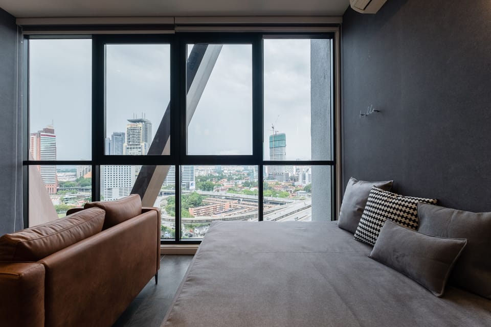 Deluxe Apartment | Living area | 50-inch flat-screen TV with premium channels