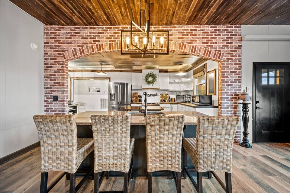 Beautiful brick design around the modern farmhouse kitchen.
