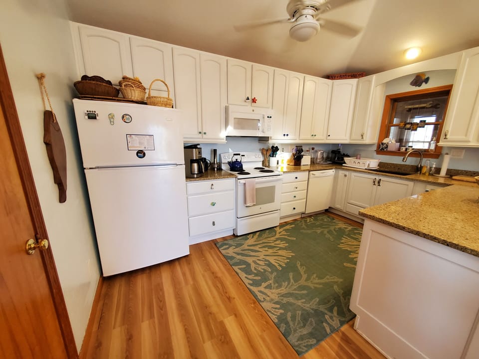 Kitchen - Bright and open this well-appointed kitchen is great for a large family.