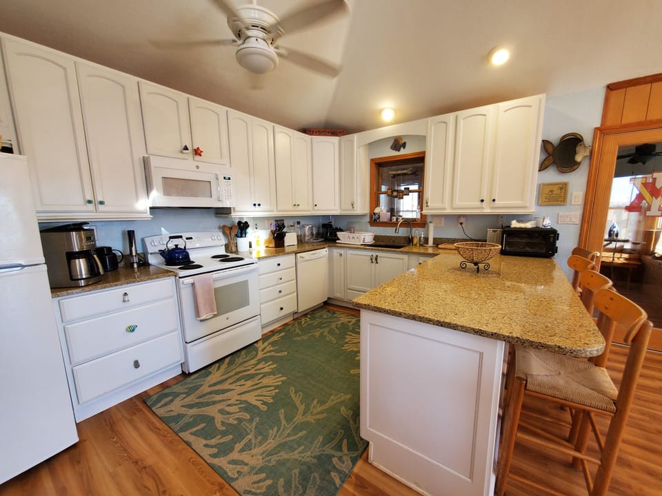 Kitchen - Bright and open this well-appointed kitchen is great for a large family.