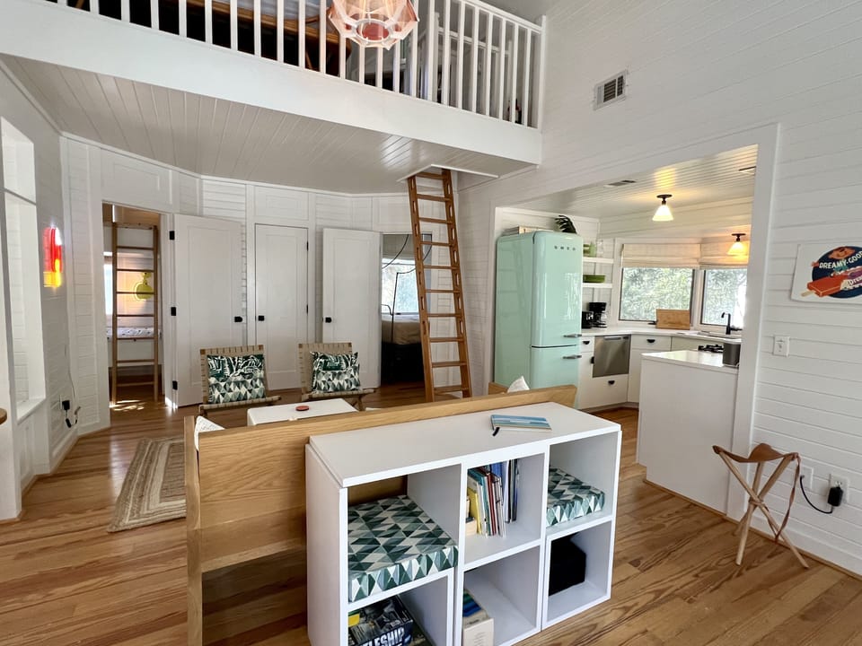 ENTRY FOYER TO OPEN LIVING, DINING, & KITCHEN