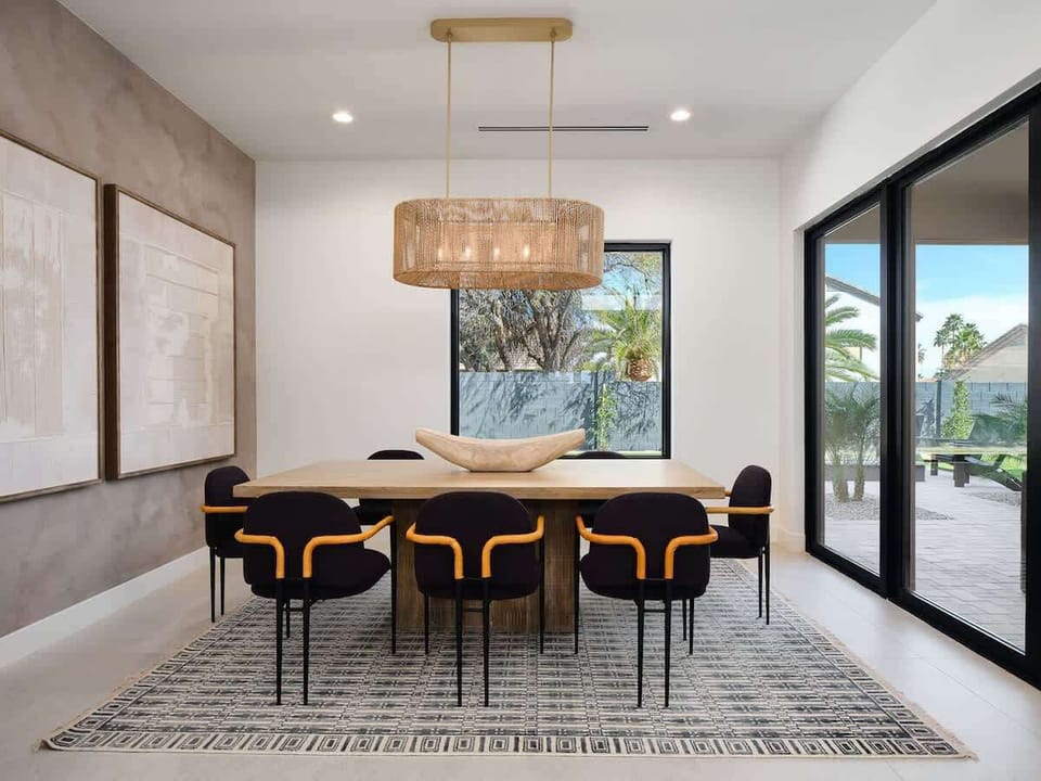 Formal dining area set for 8 guests.