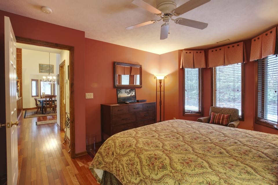 The main level guest room also has a television.