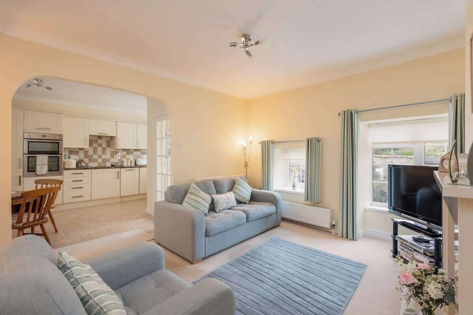 Sitting Room with Complete with Comfy Sofas, TV, Wifi and electric fire 

*"We found Chris’s place a home from home"*