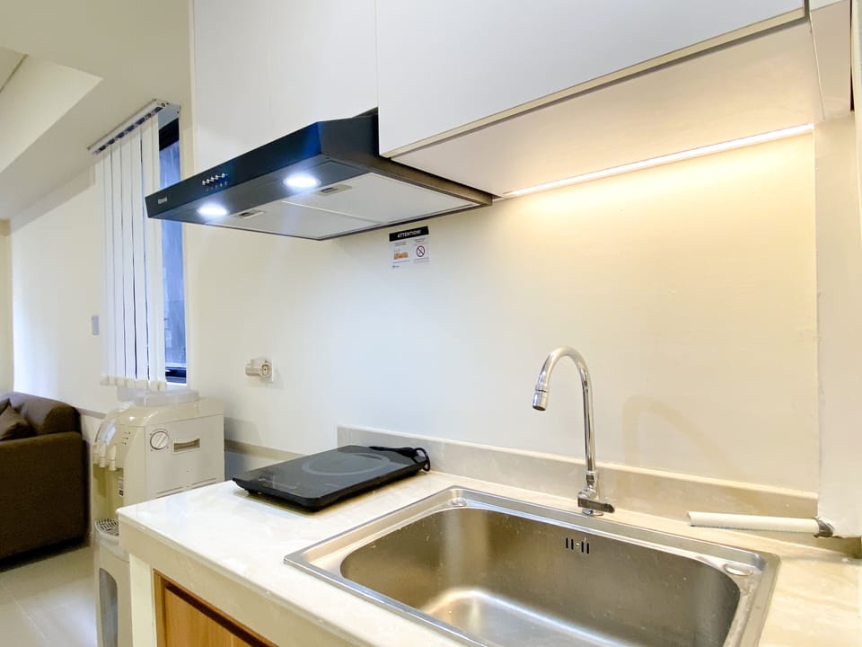 Apartment | Private kitchen | Fridge, stovetop, rice cooker, dining tables
