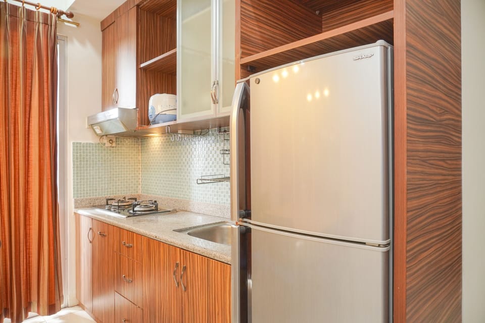 Apartment | Private kitchen | Fridge, stovetop, rice cooker, dining tables