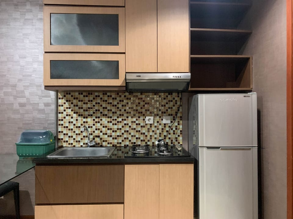 Apartment | Private kitchen | Fridge, stovetop, rice cooker, dining tables