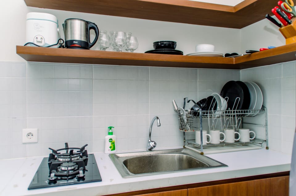 Apartment | Private kitchen | Fridge, stovetop, rice cooker, dining tables