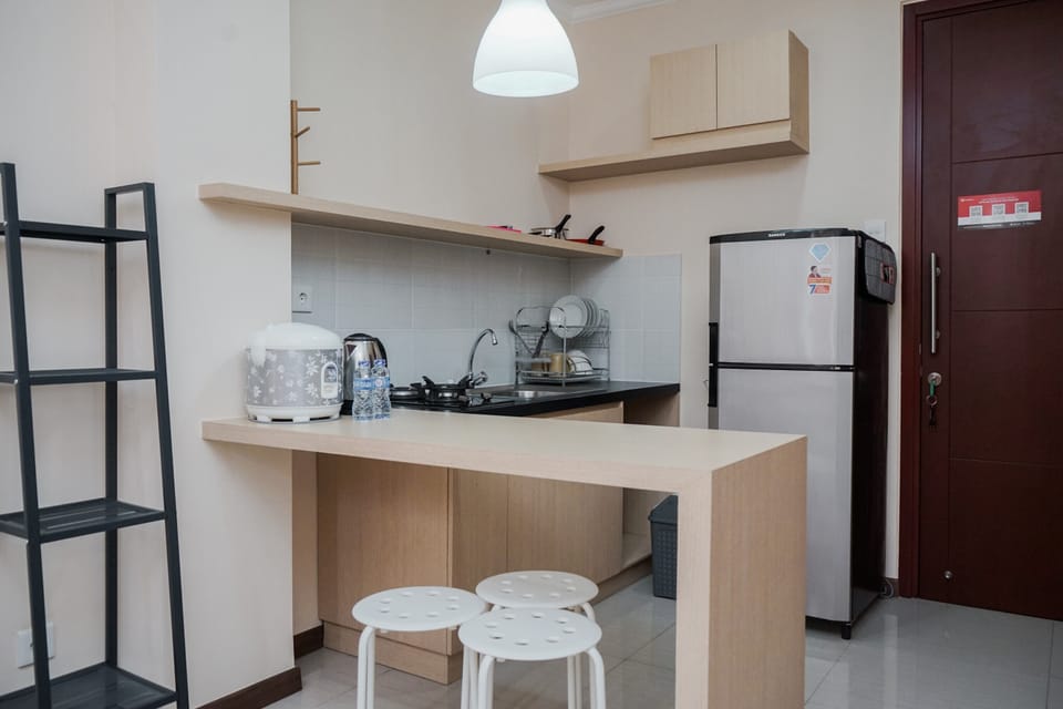 Apartment | Private kitchen | Fridge, stovetop, rice cooker, dining tables