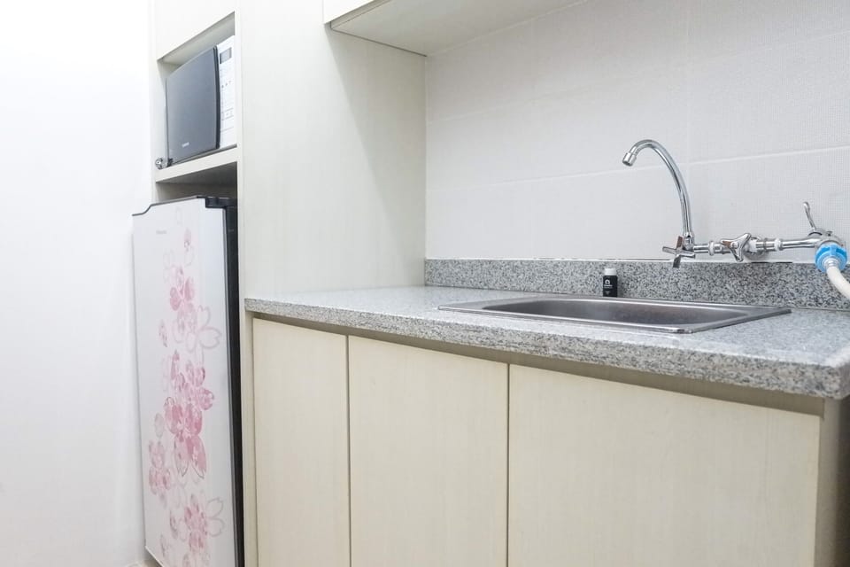 Apartment | Private kitchen | Fridge, microwave, stovetop, dining tables