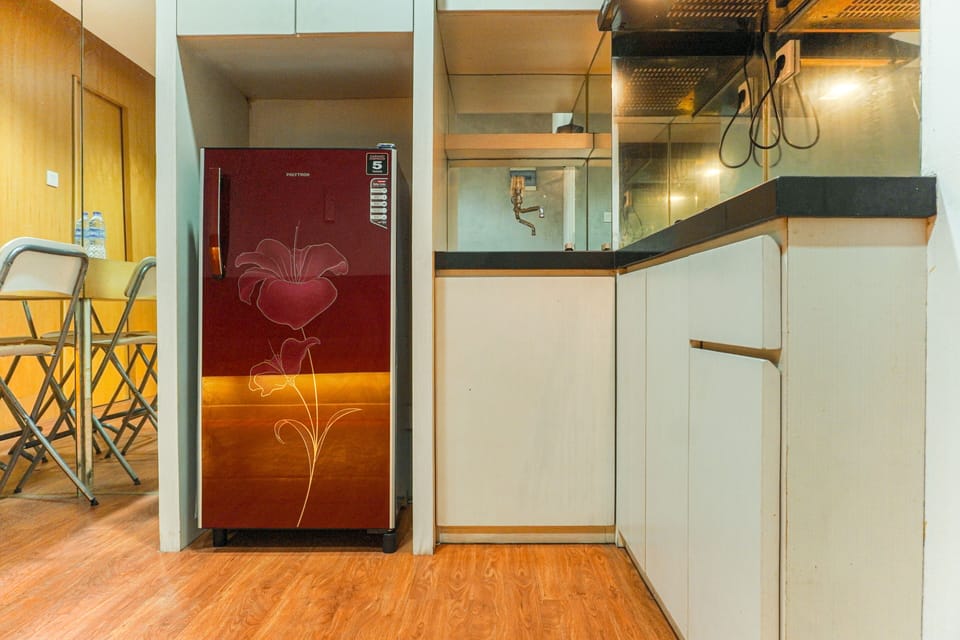 Apartment | Private kitchen | Fridge, stovetop, rice cooker, dining tables