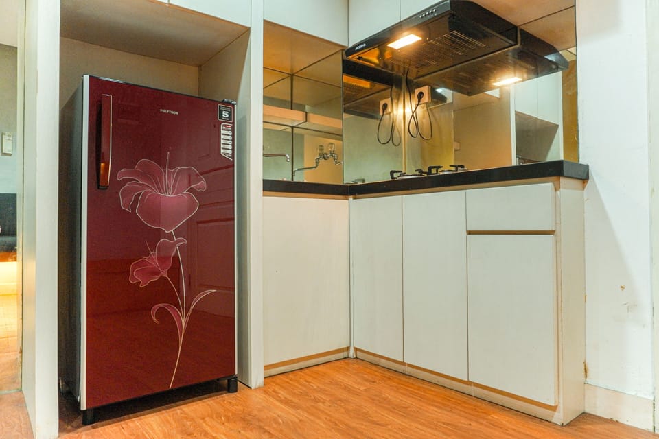 Apartment | Private kitchen | Fridge, stovetop, rice cooker, dining tables