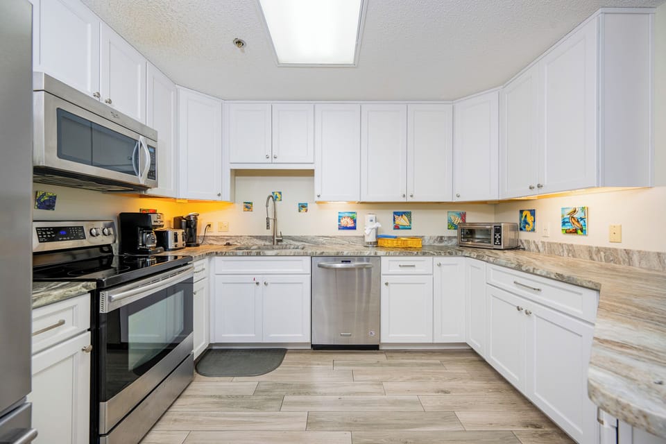 Create delicious meals in your spacious kitchen, surrounded by playful artwork that adds a cheerful vibe