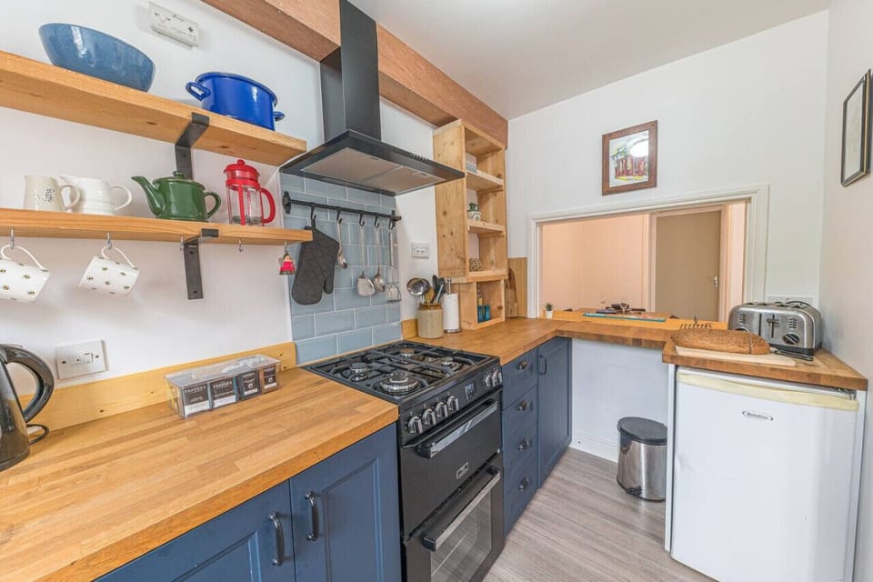 Kitchen with under worktop fridge