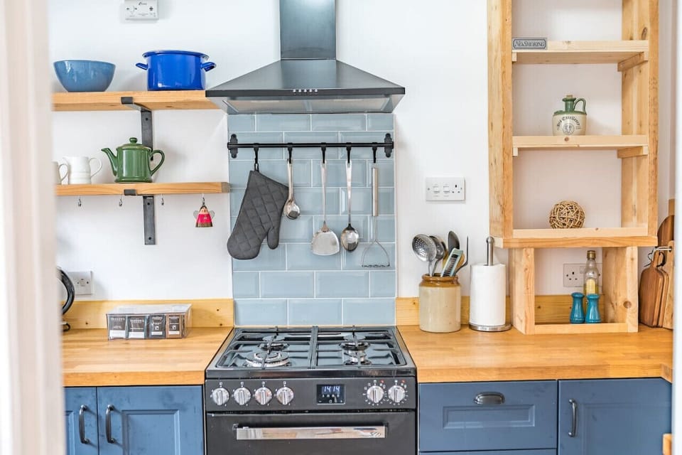 Kitchen with electric double oven and gas hobs