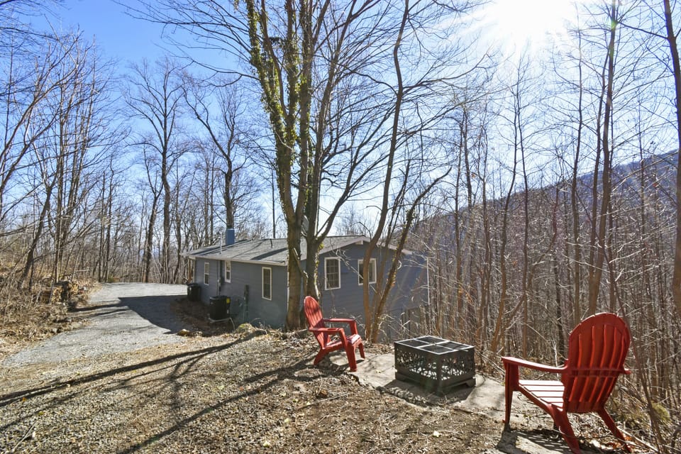 Outside firepit & Adirondack chairs
