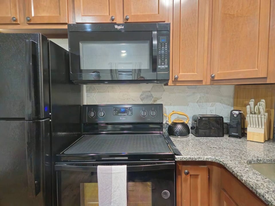 Keurig coffee machine, pots, pans, bakeware, glassware, silverware, wine glasses, toaster, can openers and more.