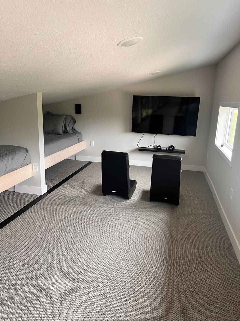 Loft with 2 built in bunks and a Nintendo on each side of the room!