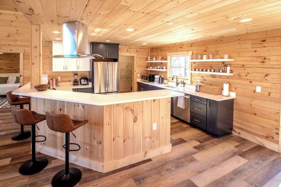 Fully stacked kitchen with a gas range, an Instant Pot and Vitamix.