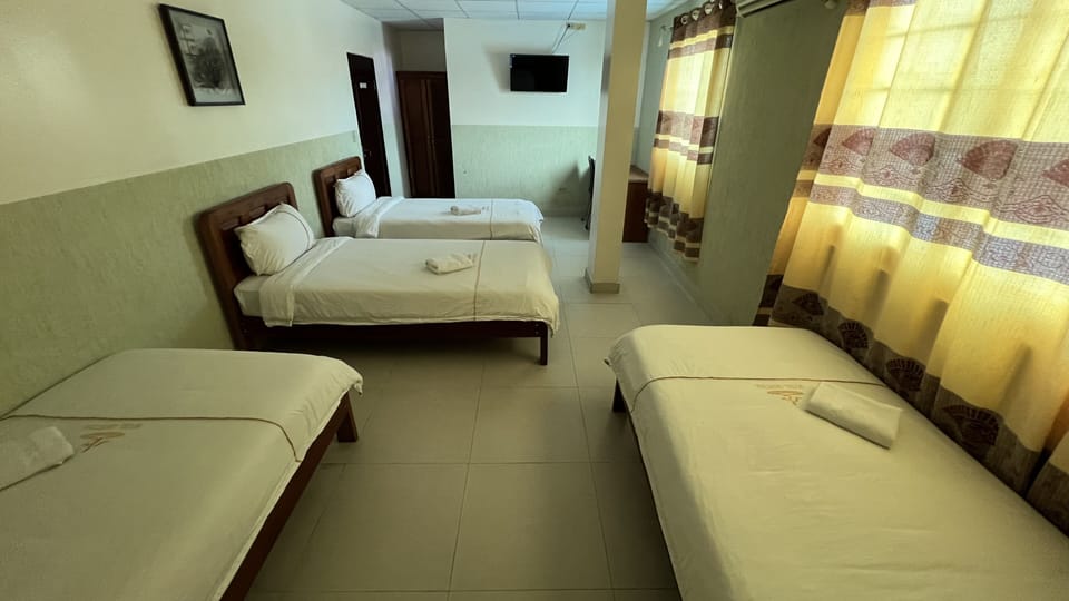 Basic Quadruple Room | Iron/ironing board, free WiFi, bed sheets