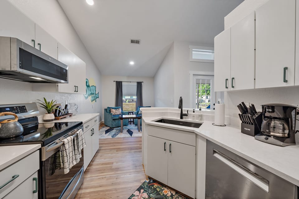 The dining room flows seamlessly into the fully-equipped kitchen!
