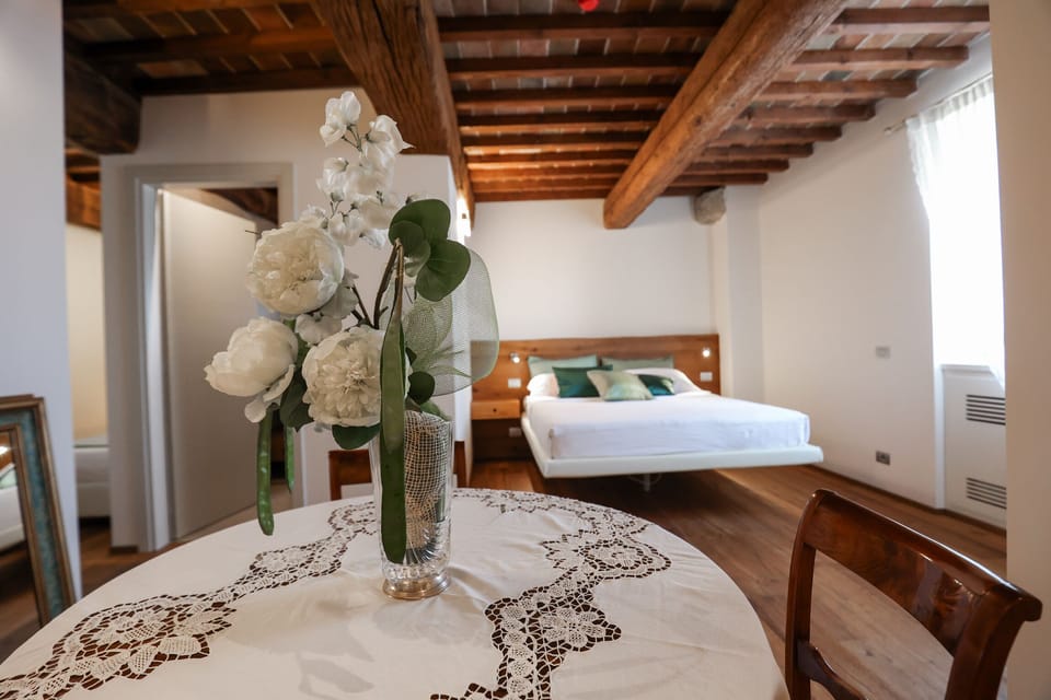 Deluxe Triple Room, Sea View | Hypo-allergenic bedding, down comforters, minibar, in-room safe