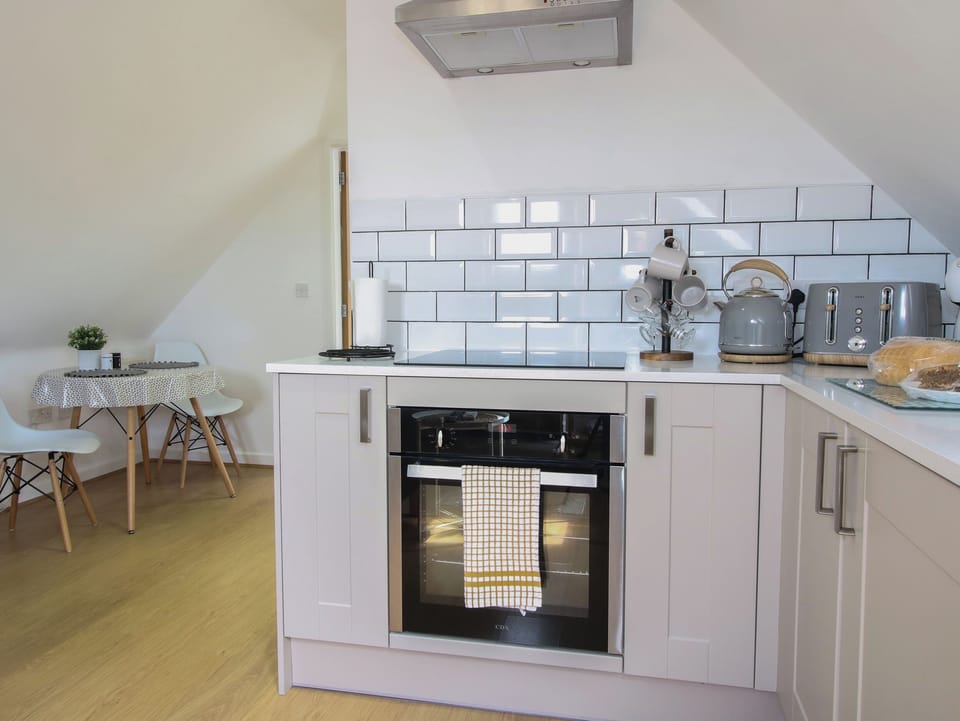 Fridge, electric kettle, toaster, cookware/dishes/utensils