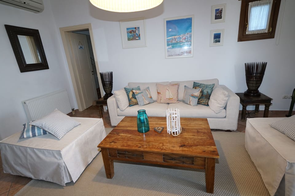 Exclusive Apartment | Living area | 42-inch Smart TV with digital channels, DVD player, pay movies