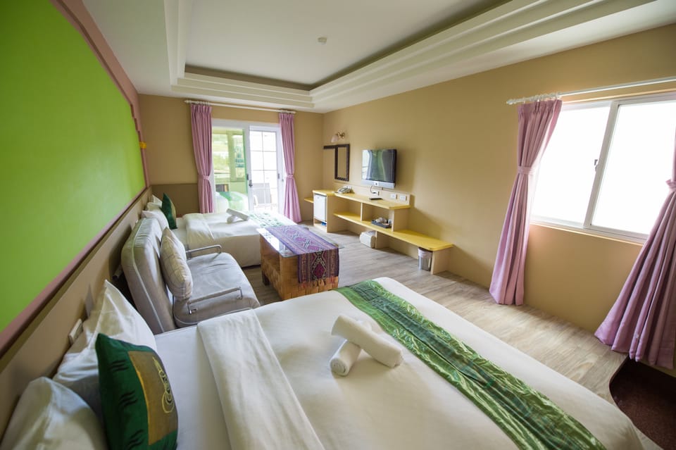 Quadruple Room, 1 Bedroom, Balcony | 1 bedroom, blackout drapes, free WiFi, bed sheets