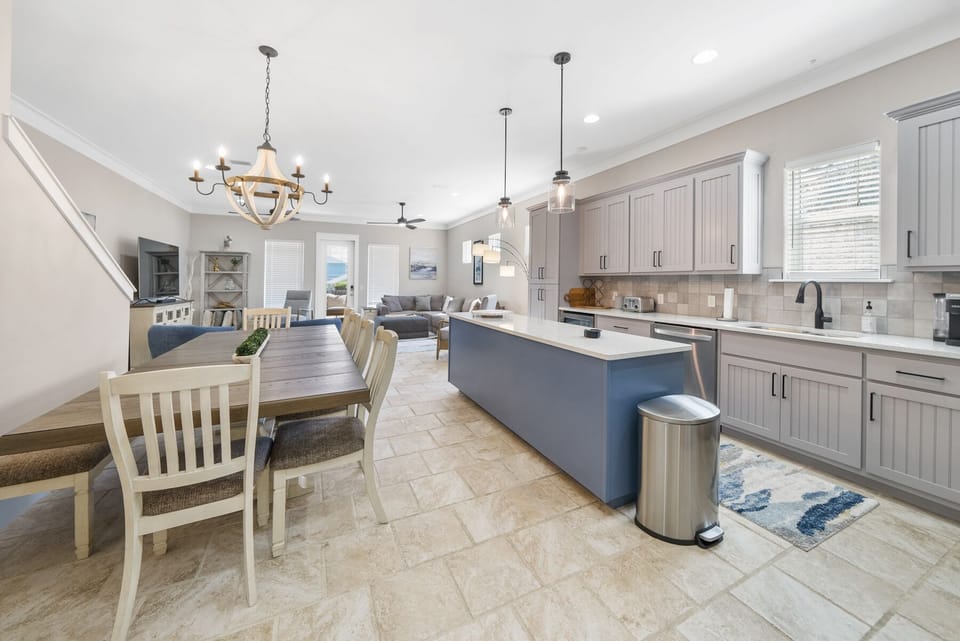 Your open-concept kitchen flows beautifully into the dining and living areas, creating the perfect space for memorable gatherings with loved ones.