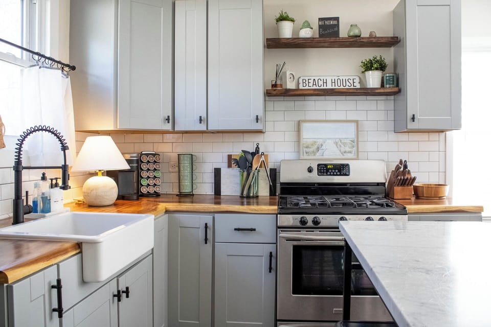 This small cottage kitchen is so inviting! Warm, charming, and full of character.